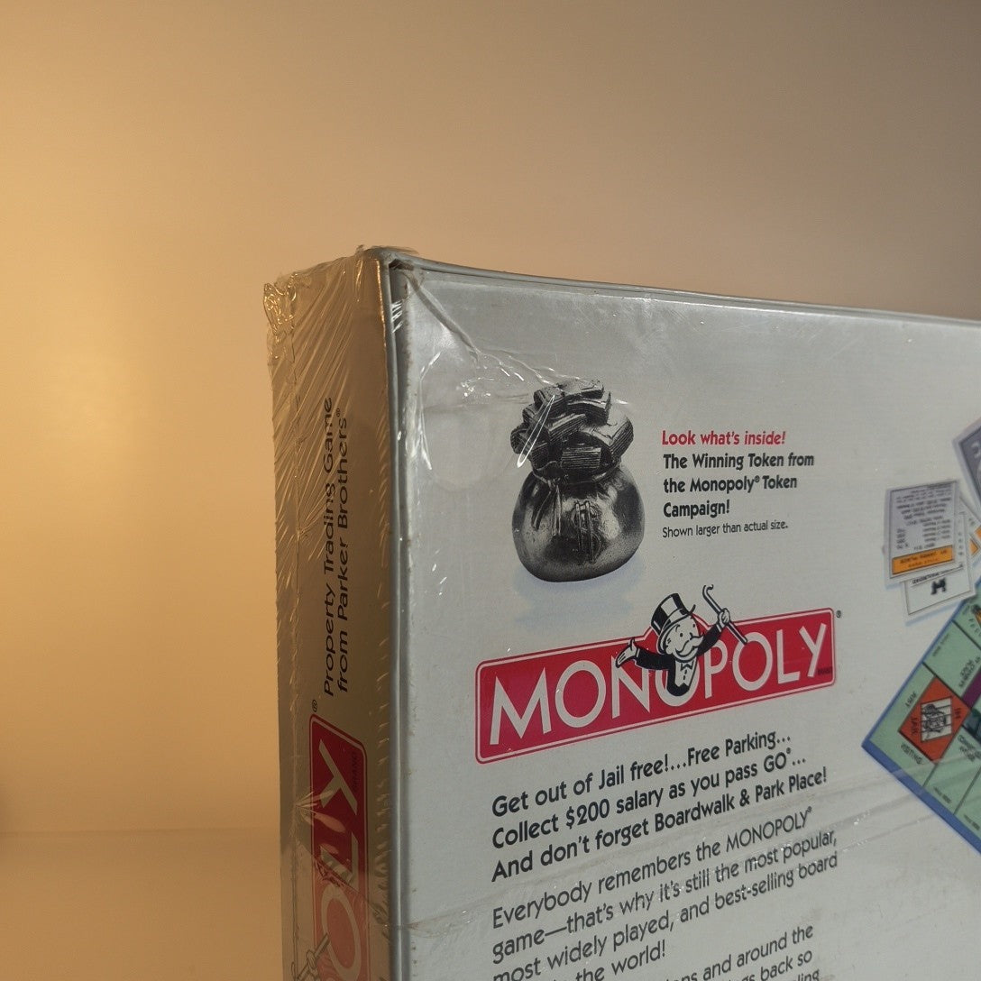 Monopoly Property Trading Board Game - 1999 Hasbro USA - Sealed Torn Plastic