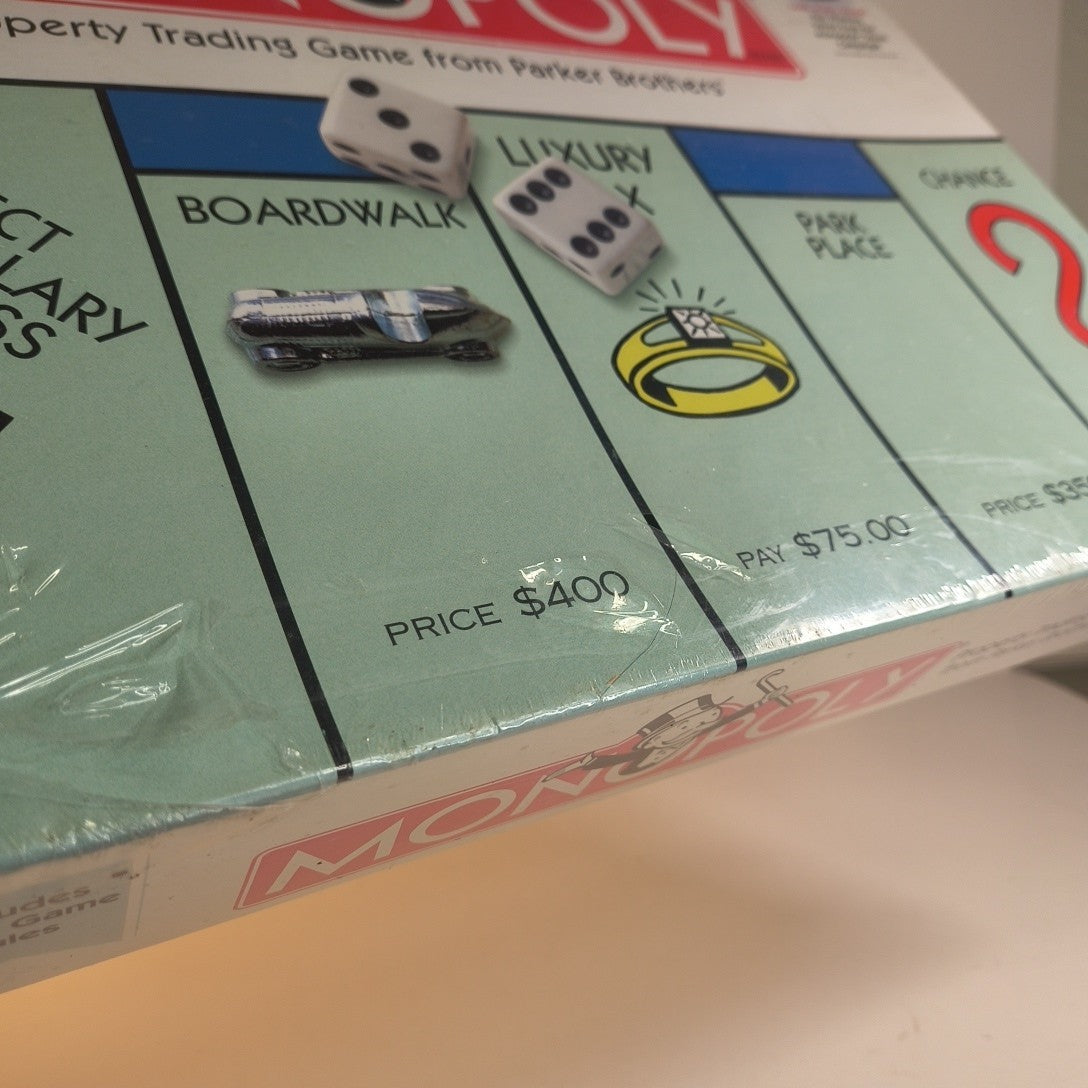 Monopoly Property Trading Board Game - 1999 Hasbro USA - Sealed Torn Plastic